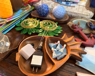 Wooden bowl with wooden star ornaments, starfish, shells and decorative craft supplies