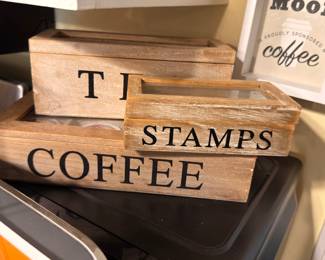 Rustic wooden crates with stenciled letters (coffee stamps) and coffee sign