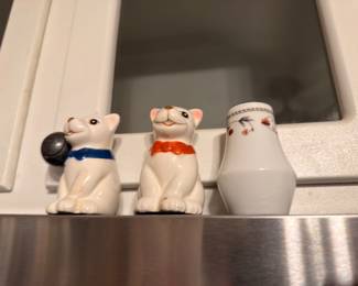 Ceramic salt and pepper shakers shaped like animals (bears) and milk glass shaker