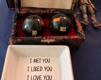 Romantic quote trinket dish with decorative spheres and action figure