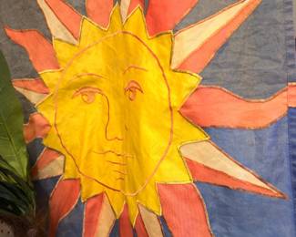 Colorful sun face wall hanging