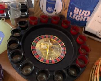 Roulette drinking game with shot glasses