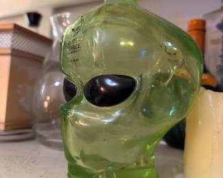 Green glass alien head jar