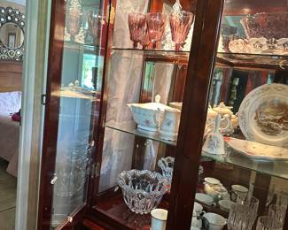 Glass shelving and mirrored back allows the most lighting to display your beautiful collections