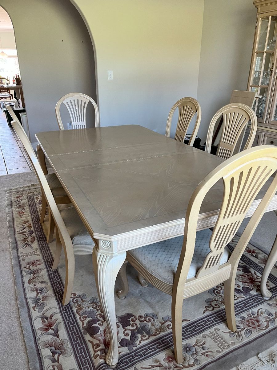 Lexington blonde dining table with six chairs
8x12 wool Aubusson deep carved rug