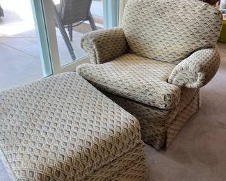 Nice upholstered arm chair and matching ottoman 
