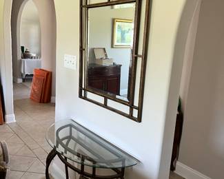 Metal half moon glass top table and matching mirror