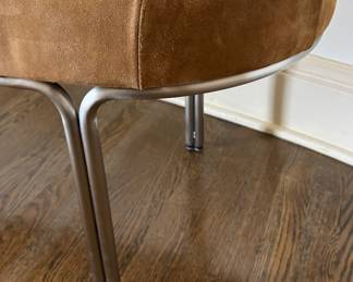 Close up of CB2 Luxury Suede Tufted Bench