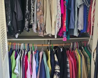 Many outfits with tags still on them