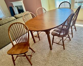 Seely Oak dining table with 2 leaves 6 chairs and pads