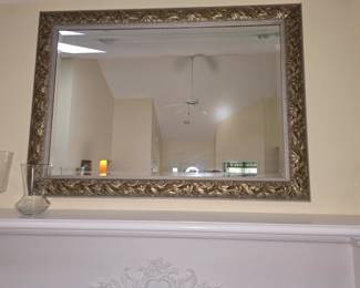 Beautifully framed mirror.