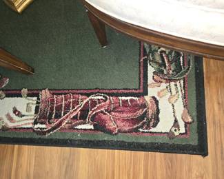 The rug has a golf theme