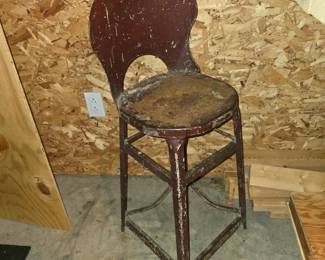 This vintage metal chair has history!