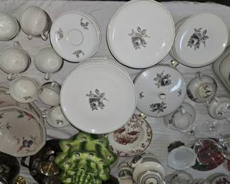 Gray rose china is service for 8.
