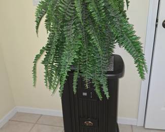 Humidifier and good looking artificial fern.