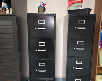 Two - Four drawer metal file cabinets