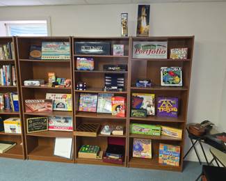 4 matching bookcases loaded with games for every age.