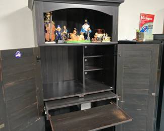 Inside, set up for computer desk with storage.