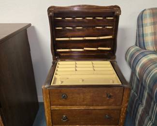 Sweet free-standing, vintage jewelry cabinet.