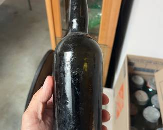 Circa 1860 black glass bottle dug near Natchez, Mississippi
