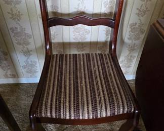One of the Dining Table Chairs