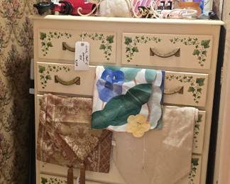 This chest of drawers is in the upstairs bathroom at the end of the hallway going left as you exit the stairway.
