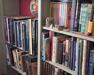 Books on the back wall of the room beyond the foyer. This room also connects with the dining room/Christmas Room. There are some vintage hardback Stephen King here!