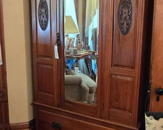 This wardrobe has shelves inside, was used to hide stereo components, but may be converted back to original purpose (portal to another dimension where lions talk).