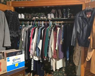 At the top of the stairs, this is the bedroom to your right. Lots of ladies clothing and vinyl records. LOTS OF ELVIS!! and also Lee Greenwood trying real hard to be Burt Reynolds. Ain't never gonna happen!