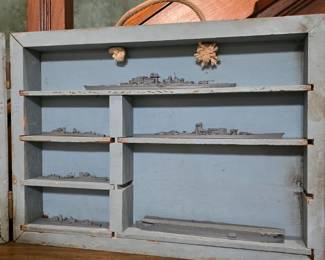 Metal miniature models of US Navy and German ships.