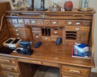 A roll top desk with an interesting feature