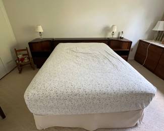 Rosewood bed with matching nightstands. Excellent condition.