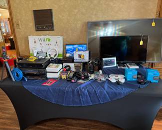 Variety of electronics, games, DVDs, CDs, vinyl