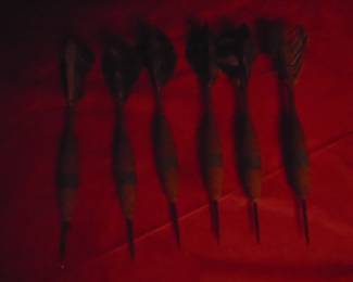 wooden darts with real featheres
