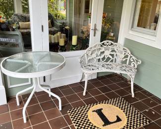 Outdoor bench and small round  table 
McKenzie child “L” outside doormat 