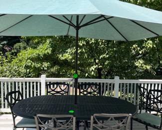 Table with 8 chairs from Backyard Living (Ridgewood) 