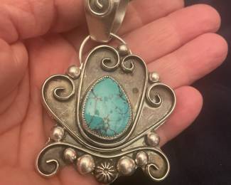 large sterling and turquoise pendant statement piece for sure