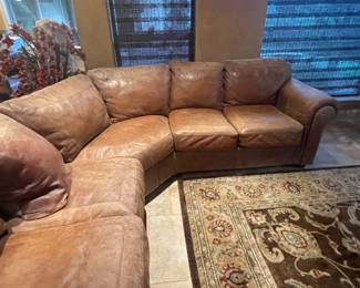 CHOCOLATE LEATHER SECTIONAL VERY HIGH END BUT HAS 1 SEAT THAT IS DAMAGED GREAT DEAL FOR COLLEGE BOUND ANY ONE THAT NEEDS A SOFA ON THE CHEAP - SEE NEXT PICS FOR DAMAGED ONE