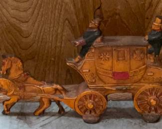 Cast iron door stop!  You'll find this in the kitchen at end of cabinet (sink end)