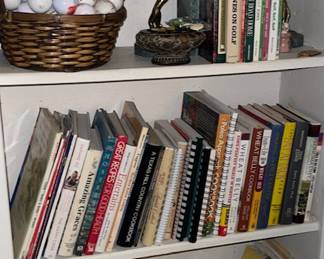 More books, oh and balls, lots and lots of golf balls.  Check out the gold clubs in the garage when you visit!