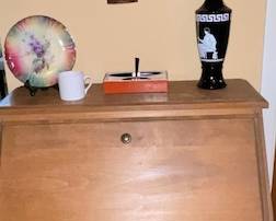 Here's that secretary.  One handle needs to be replaced, but handles are affordable and Amazon ships more anywhere