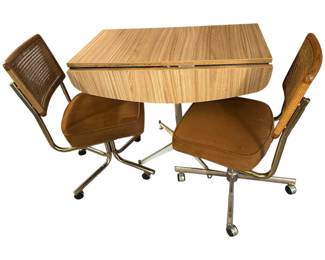 Vintage Mid Century Table and Wicker Back Rolling Chairs