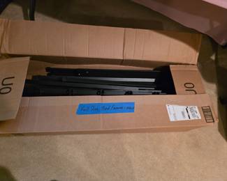 Brand new, full size bed frame!