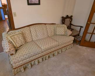 Beautiful sofa couch with wooden trim back. Excellent condition!