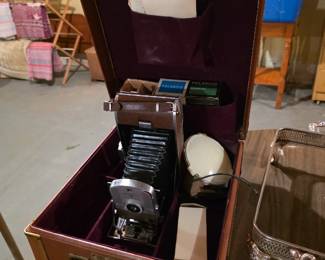 Antique Polaroid camera with case.