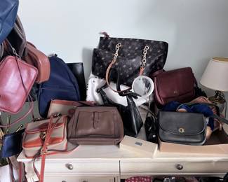 assorted bags off all colors, brands, sizes and more !
