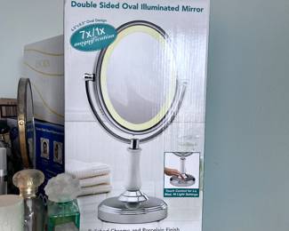 Conner double sided oval illuminator mirror (new)
