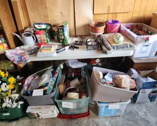 christmas decorations, gift bags, and garden items