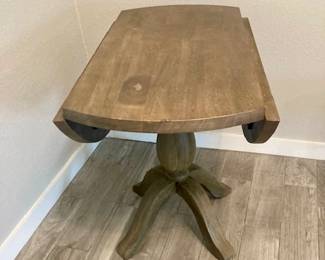Wood 36" Round Drop Leaf Pedestal Table.