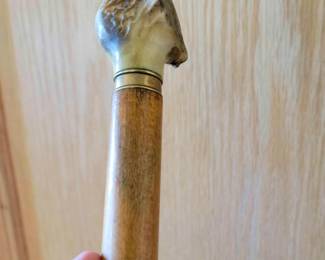 Here's one of the walking sticks. Bone topped. Horn topped. Carved.